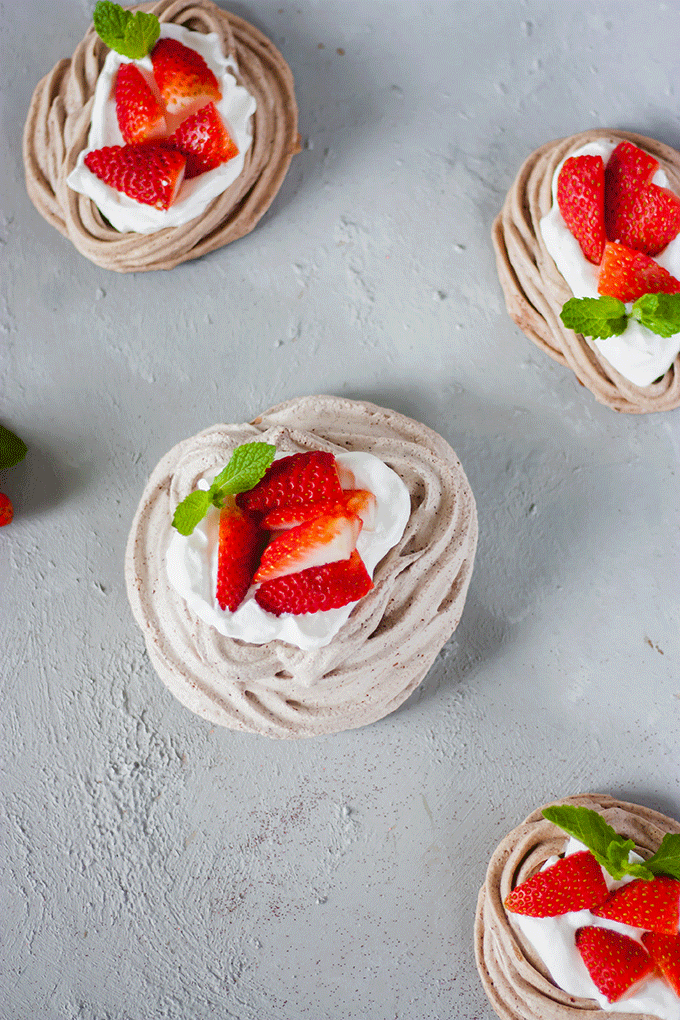 4 chocolate meringue nests on grey board
