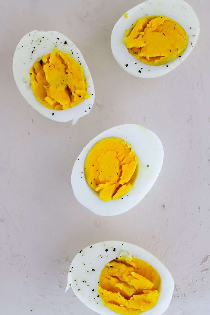 4 hard boiled eggs lined up in a row